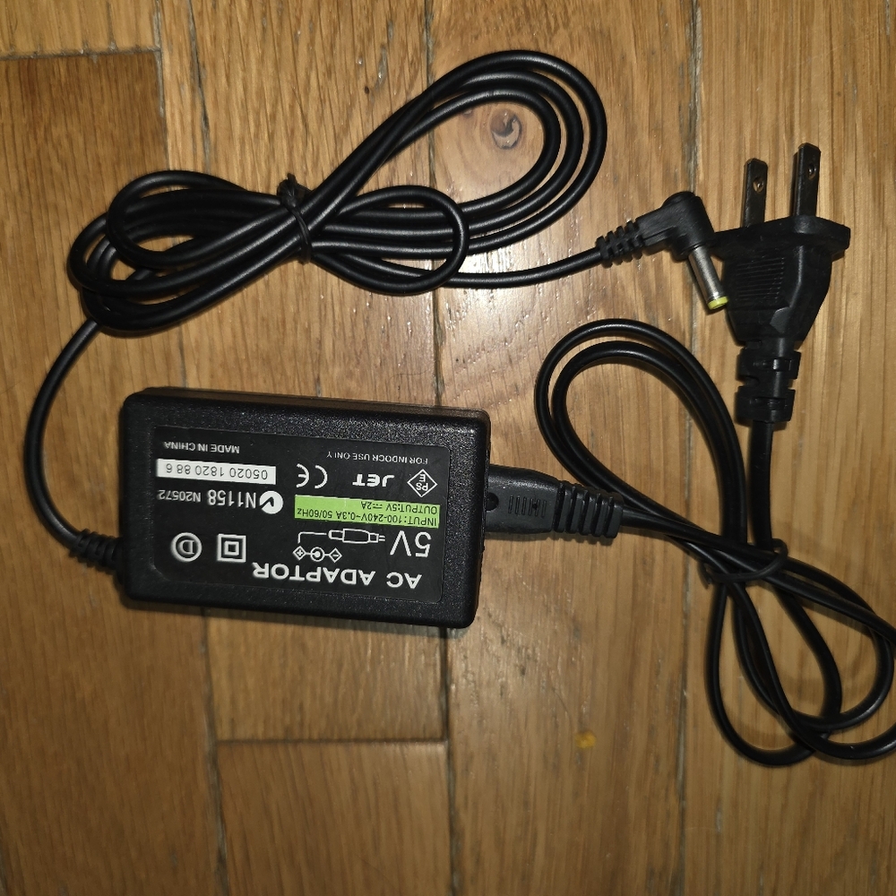 VINTAGE NEW PS VITA SERIES 1000 CHARGER WALL CHARGER POWER ADAPTER OLD STOCK..
